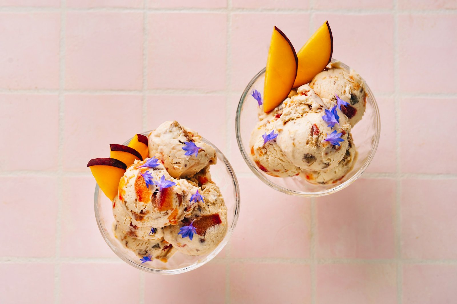 Peach gelato balls in glass cups